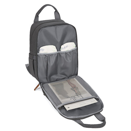 Multi-functional Diaper Bag With A Baby Changing Pad And A Warming Compartment