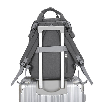 Multi-functional Diaper Bag With A Baby Changing Pad And A Warming Compartment
